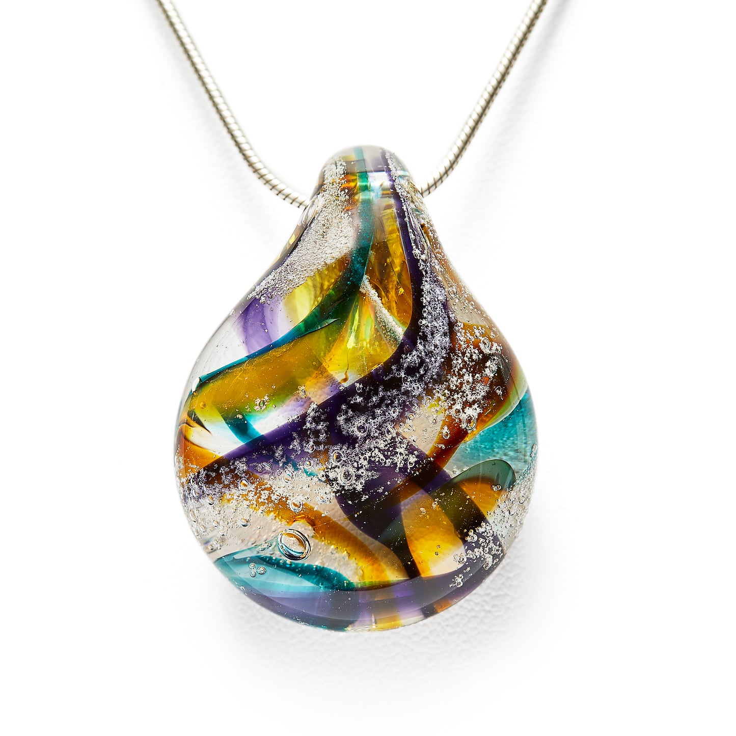 Memorial glass art pendant with cremation ash. Purple, blue, green, pink, and yellow glass. Colour combination is called "Spring."