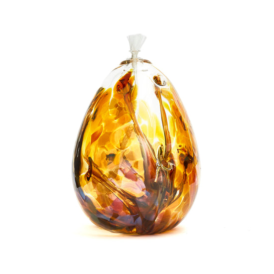 Handmade tall teardrop iris gold glass oil lamp. Made in Ontario Canada by Gray Art Glass.