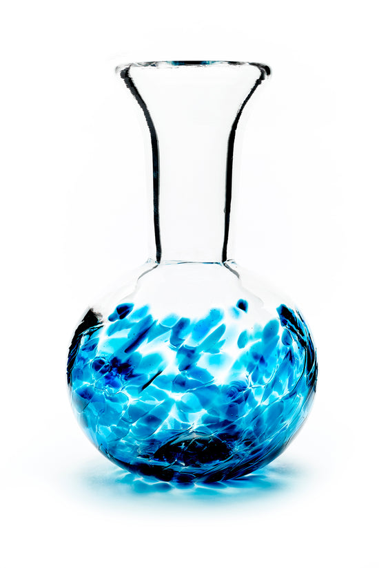 Hand blown glass vase. Teal blue glass on the bottom. Colour combination is called "Ocean Wave."