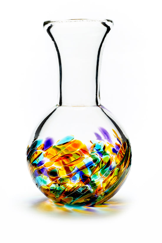 Hand blown glass vase. Purple, blue, green, pink, and yellow glass on the bottom. Colour combination is called "Spring."