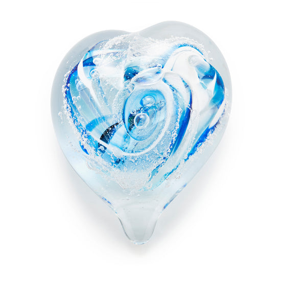 Memorial glass art heart paperweight with cremation ash. Cobalt blue, teal blue, and white glass. Colour combination is called "Winter."