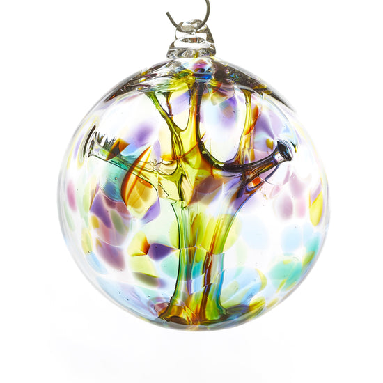 Hand blown glass witch ball. Purple, blue, green, pink, and yellow glass. Colour combination is called "Spring."