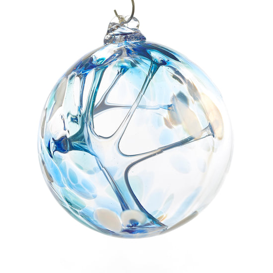 Hand blown glass witch ball. Cobalt blue, teal blue, and white glass. Colour combination is called "Winter."